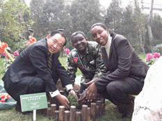 Chairman of China World Peace Foundation, Together with Kenya Ambassador caring small tree in Peace Garden